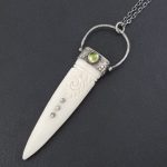 carved bone talisman pendant