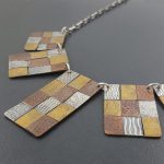 mixed metal bib necklace - Michele Grady