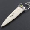 carved bone talisman pendant
